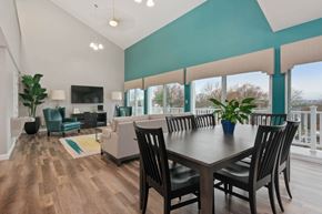 Fall River apartment for rent - A dining room with a wooden table and chairs. at South Winds Apartments, Fall River, MA