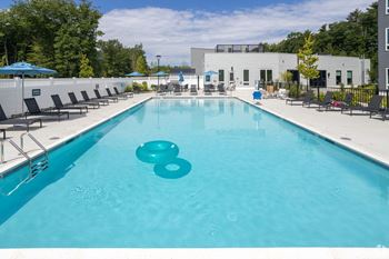 Outdoor pool with sun shelf