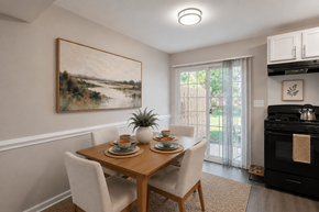Chesterfield townhouse for rent - A dining room with a wooden table set for two.