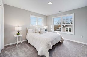 Griswold apartment for rent - a bedroom with a bed and two windows at Pleasant View Estates, Connecticut