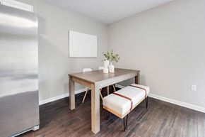Griswold apartment for rent - a dining room with a table and two stools at Pleasant View Estates, Griswold, Connecticut