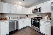 Griswold apartment for rent - a kitchen with stainless steel appliances and white cabinets at Pleasant View Estates, Griswold, 06351