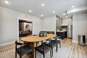 Danbury apartment for rent - A dining area with a round wooden table and chairs.