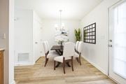 Hooksett apartment for rent - A dining room with a table and chairs at Windsor Terrace, Hooksett, NH