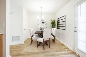 Hooksett apartment for rent - A dining room with a table and chairs at Windsor Terrace, Hooksett, NH