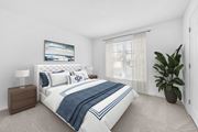 Hooksett apartment for rent - A bedroom with a large bed and a painting on the wall at Windsor Terrace, Hooksett, NH