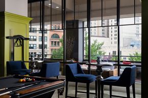 Detroit apartment for rent - a collage of photos of tables and chairs and plants