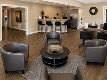 Las Vegas apartment for rent - A living room with a grey sofa and a black coffee table.