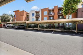 San Marcos apartment for rent - an empty parking lot in front of an apartment building