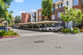 San Marcos apartment for rent - a rendering of a parking lot in front of an apartment building