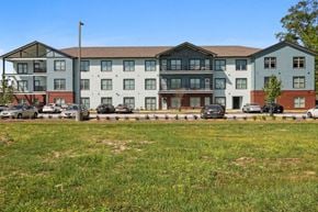 Hammond apartment for rent - an apartment building with cars parked in front of it