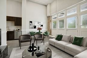 Donaldsonville apartment for rent - a living room with a couch and a table with chairs