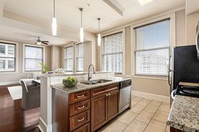 New Orleans apartment for rent - Open-concept kitchen in a downtown New Orleans apartment with stainless steel appliances
