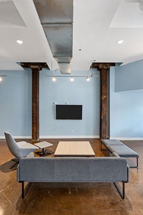 Shreveport apartment for rent - a conference room with a table and chairs and a television