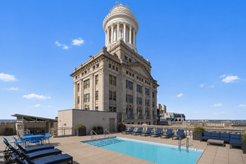 Stunning renovated rooftop amenity deck with panoramic city views