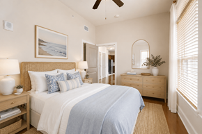 New Orleans apartment for rent - A bedroom with a large bed and a painting on the wall.
