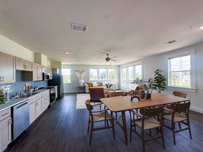 Lake Charles apartment for rent - A modern kitchen with a dining table and chairs.