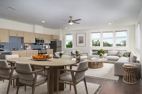 Lake Charles apartment for rent - A modern dining room with a wooden table and chairs.
