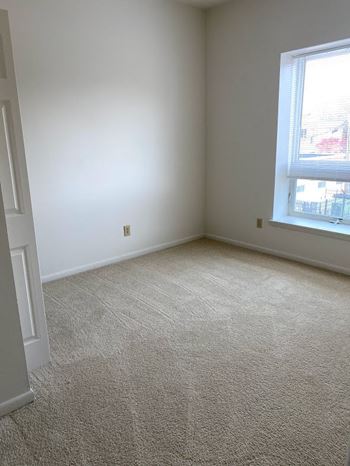 Wall-to-wall carpet (check for flooring specifics)
