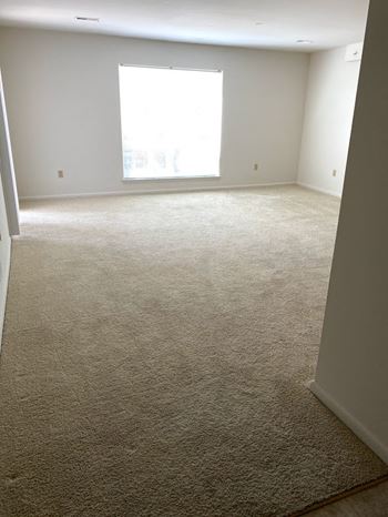 Wall-to-wall carpet (check for flooring specifics)