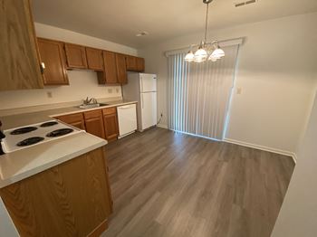 Wood-grain vinyl plank (check for flooring specifics)
