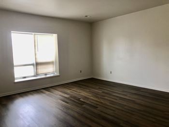 Wood-grain vinyl plank (check for flooring specifics)