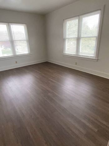 Wood-grain vinyl plank (check for flooring specifics)