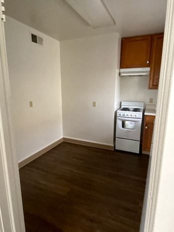 Wood-grain vinyl plank (check for flooring specifics)