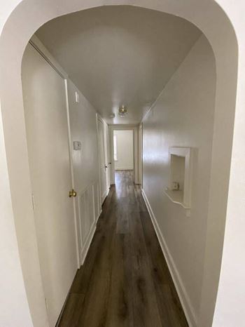 Wood-grain vinyl plank (check for flooring specifics)