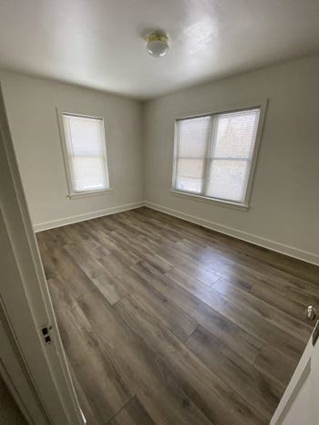 Wood-grain vinyl plank (check for flooring specifics)