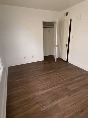 Wood-grain vinyl plank (check for flooring specifics)