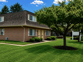 Reynoldsburg townhouse for rent - A house with a tree in front of it.