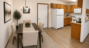 Findlay apartment for rent - A dining room with a table and chairs is shown.