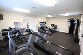 Reynoldsburg apartment for rent - A gym with treadmills and elliptical machines.