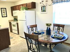 Huber Heights apartment for rent - A kitchen with a table set for two.