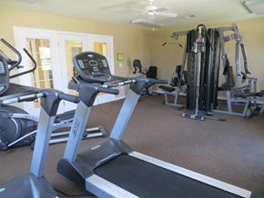 Huber Heights apartment for rent - A home gym with treadmills and other exercise equipment.