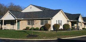 Newark apartment for rent - A house with a green door and a grey roof.