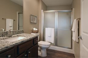 Groveport apartment for rent - A bathroom with a toilet, sink, and shower.
