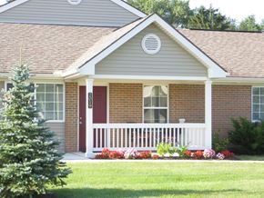 Springfield apartment for rent - a home with a porch and a red door