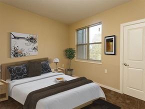 Washington apartment for rent - a bedroom with a bed and a window