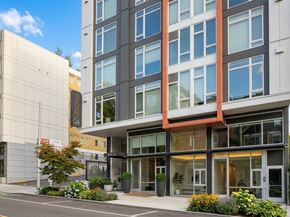 Seattle apartment for rent - Modern apartment building exterior and street level entrance at 306 QA in Seattle.