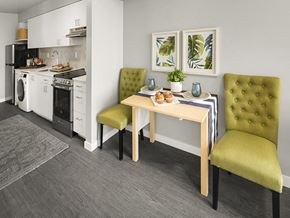 Seattle apartment for rent - a kitchen and dining room with a table and chairs