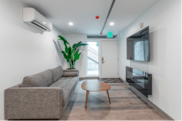Seattle apartment for rent - a living room with a couch and a coffee table