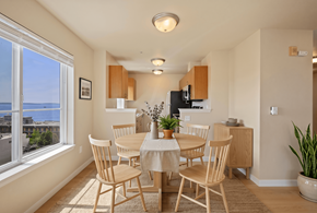 Seattle apartment for rent - A dining room with a table set for four.