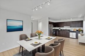 Seattle apartment for rent - a dining room with a white table and chairs