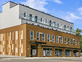 Seattle apartment for rent - a large building on the side of a street