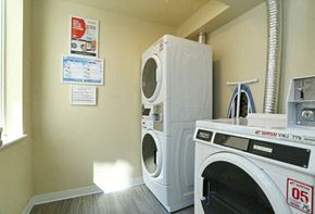 Seattle apartment for rent - a washing machine and a dryer in a laundry room