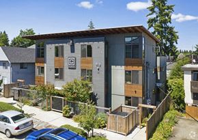 Seattle apartment for rent - a modern house with a blue and wood facade