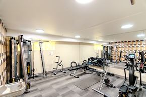 Seattle apartment for rent - A well-equipped gym with various exercise machines.