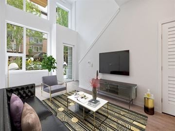 Seattle apartment for rent - a living room with a couch and a television